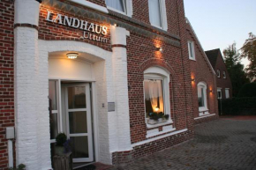 Отель Hotel Garni Landhaus Uttum  Гретзил